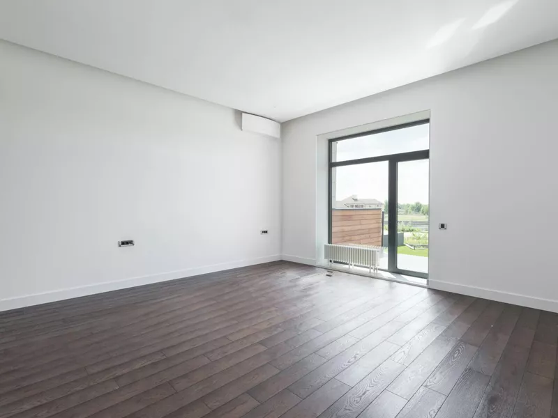 an empty room used for ai virtual staging before image